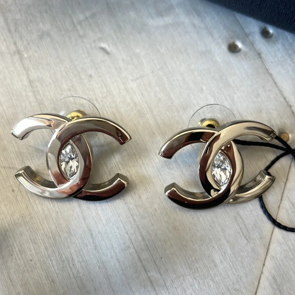 Chanel oversize gold logo earrings with crystal center with box
